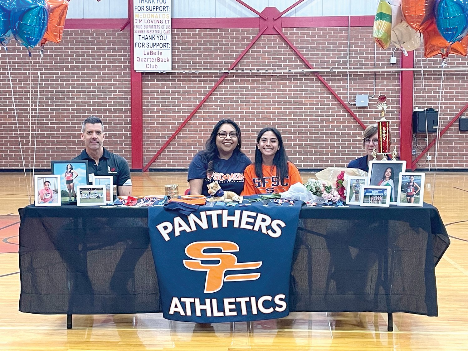 Senior Alexis Camacho-Ramirez, a three-sport athlete and honor student, signed her letter of intent to run cross country and track for South Florida State College.